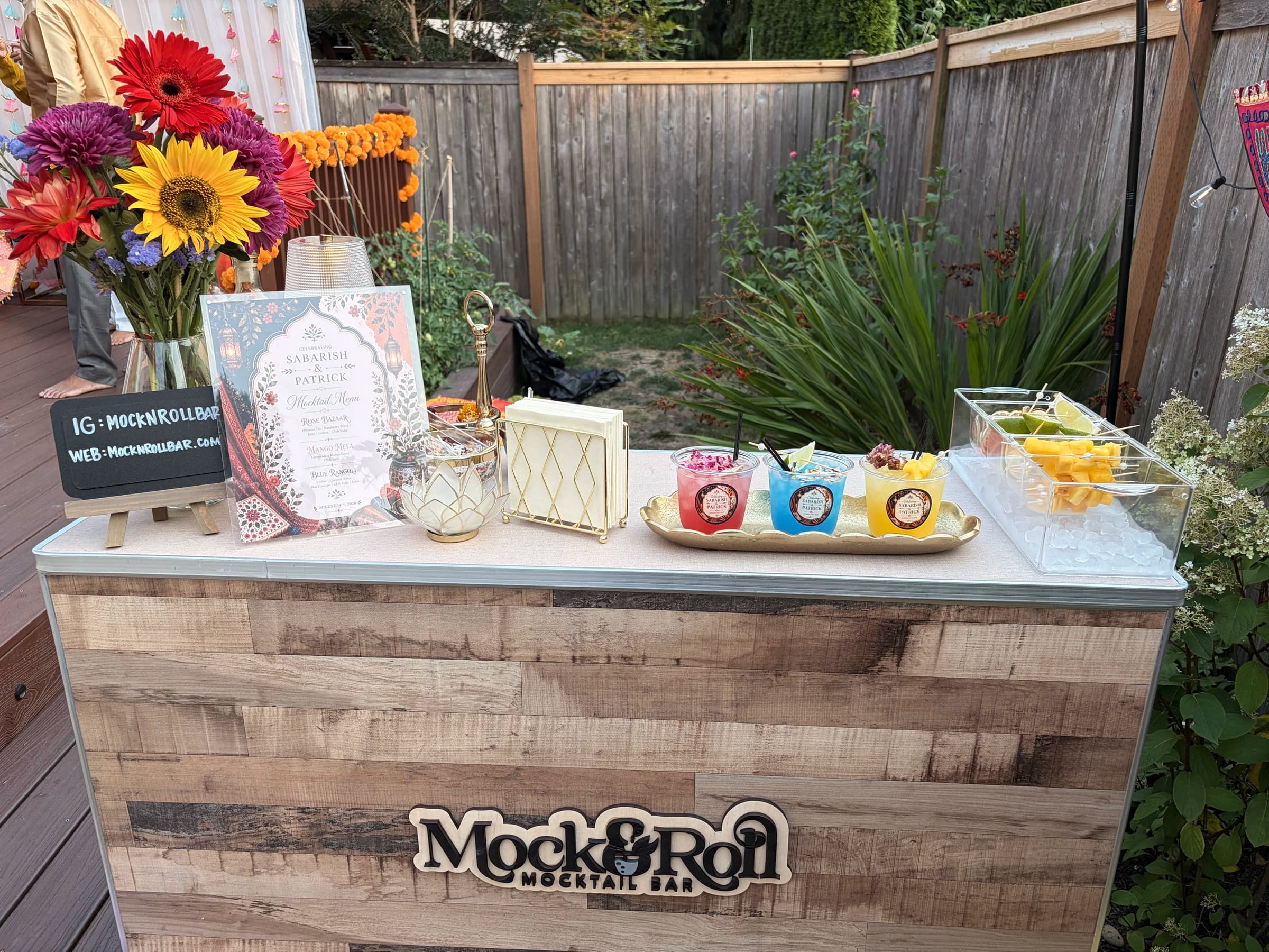 Panoramic view of a Mock & Roll mocktail spread at a festive gathering