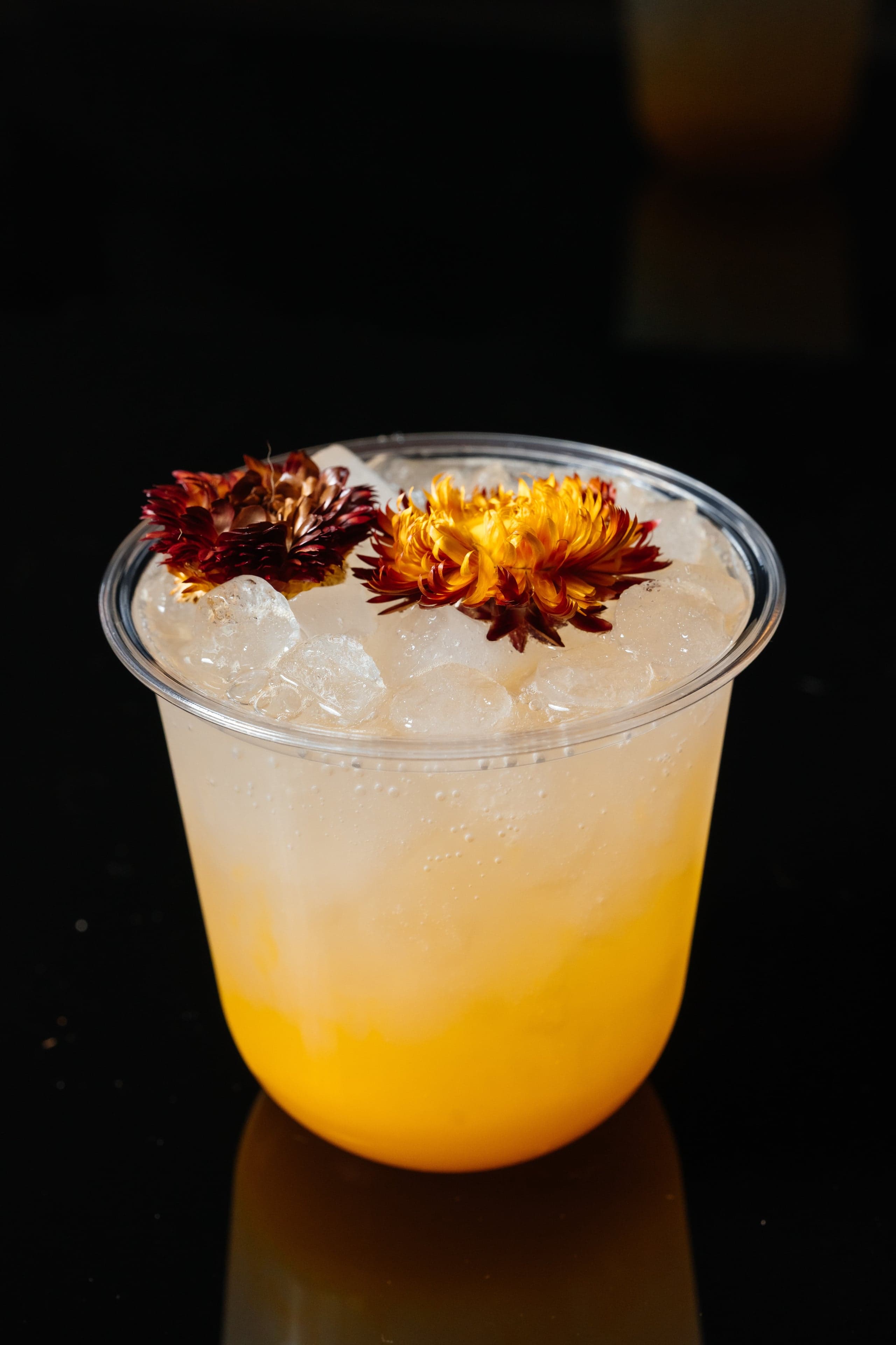 Pineapple Sunrise — Pineapple juice and mango puree topped off with club soda